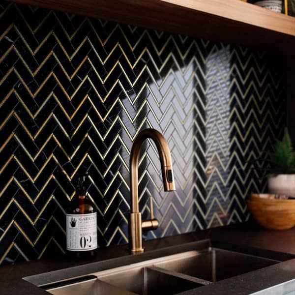 White and Gold Kitchen with Black Herringbone Floor Tiles