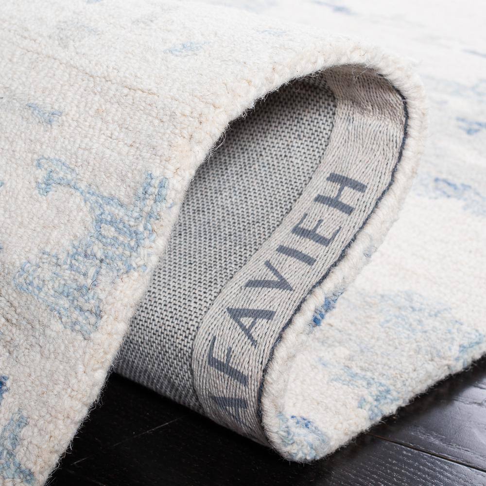 Ivory and Blue Abstract Hand-Tufted Wool 8' x 10' Rug