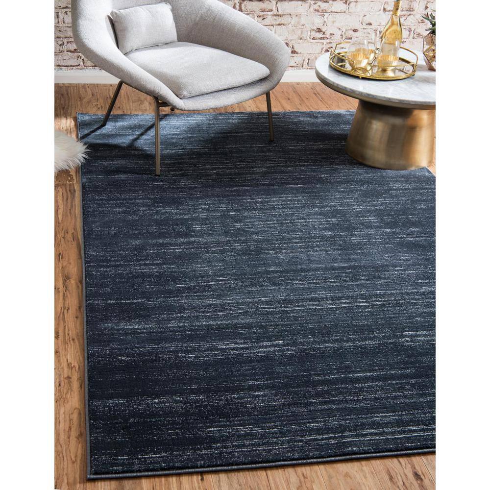 Navy Blue and Ivory 9' x 12' Easy-Care Synthetic Area Rug