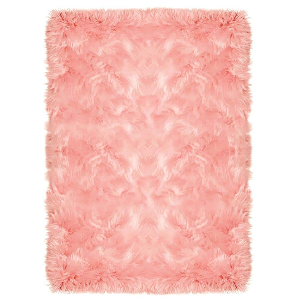 Premium Photo  A pink fluffy rug that is pink and white.