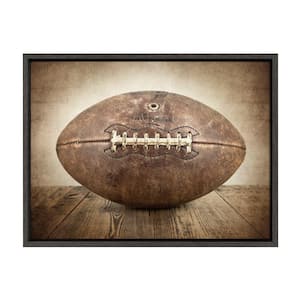 Sylvie "Vintage Football" by Saint and Sailor Studios 24 in. x 18 in. Framed Canvas Wall Art
