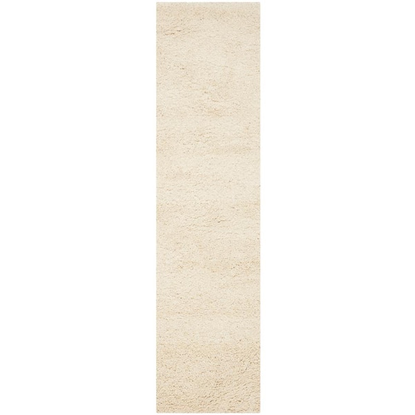SAFAVIEH Santa Monica Shag Ivory 2 ft. x 11 ft. Solid Runner Rug