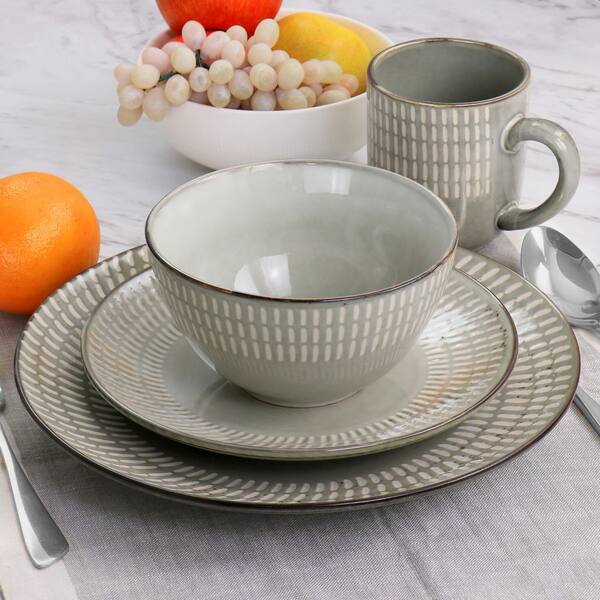 https://images.thdstatic.com/productImages/6b00ac83-43a0-4b69-9e3f-3c5ad516f158/svn/gray-gibson-elite-dinnerware-sets-985118805m-1d_600.jpg