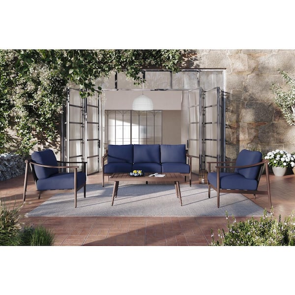 New Classic Furniture Moana 4-Piece Metal and Wicker Patio Conversation Seating Set with Blue Cushions