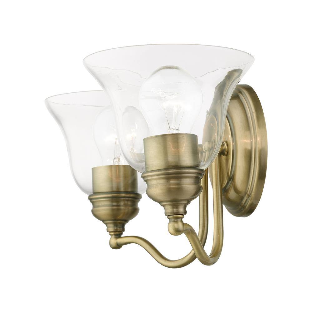 Antique Brass Dual-Light Vanity with Hand-Blown Clear Glass Shade