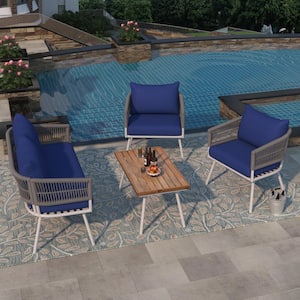 Grey 4-Piece Wicker Patio Conversation Set with Blue Cushions and Wood Top Table