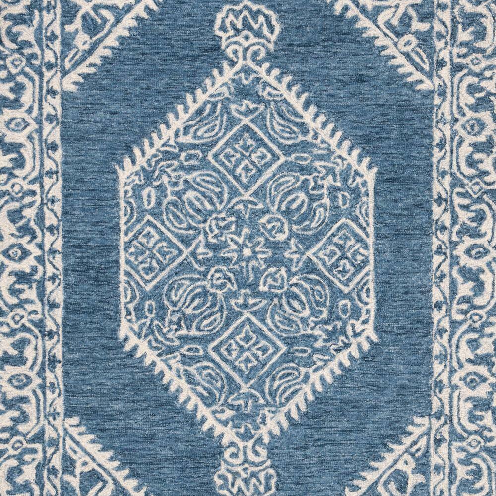Blue and Ivory Tufted Wool 4' x 6' Area Rug