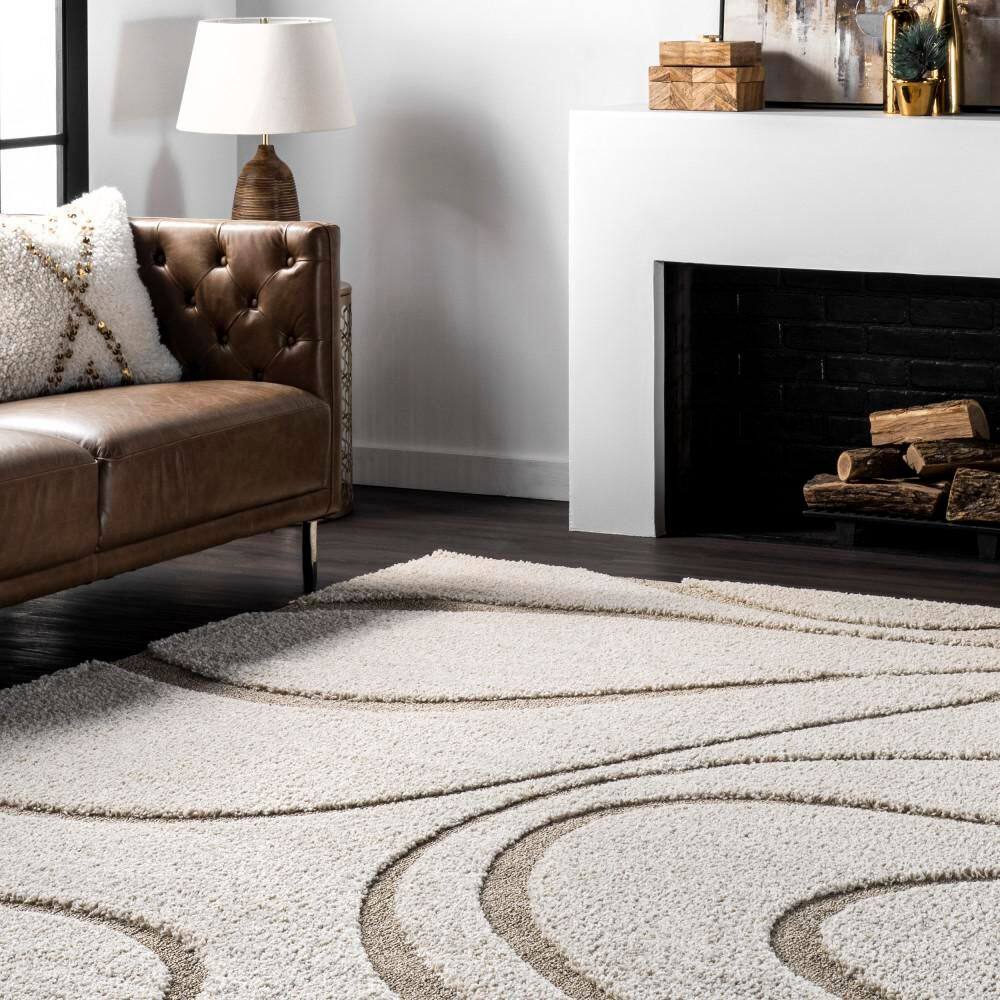 Carolyn Off-White Synthetic Tufted Shag Round Rug, 7' 10"