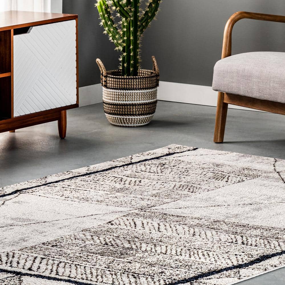 Beige 5'3" x 7'7" Moroccan-Inspired Synthetic Area Rug