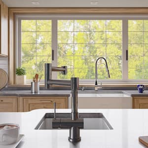 Single-Handle Standard Kitchen Faucet in Polished Stainless Steel
