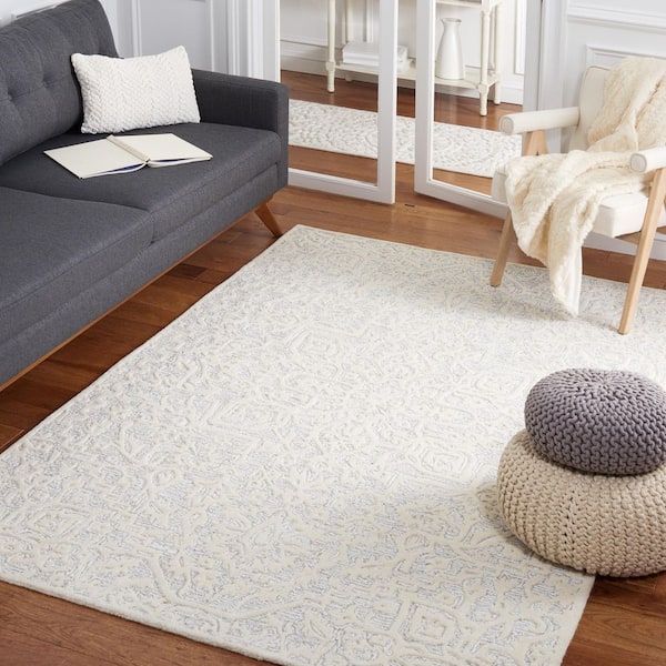 Antiquity 5 ft. x 8 ft. Silver/Ivory Textured Medallion Area Rug