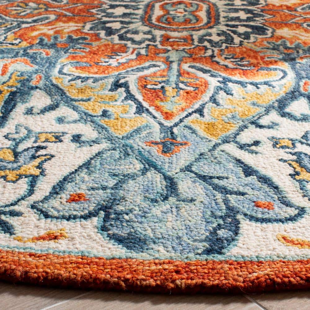 Blue and Rust Round Tufted Wool Floral Rug