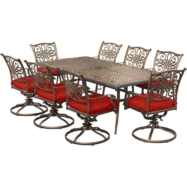 Hanover Traditions 9-Piece Aluminum Outdoor Dining Set with Swivel Rockers with Red Cushions