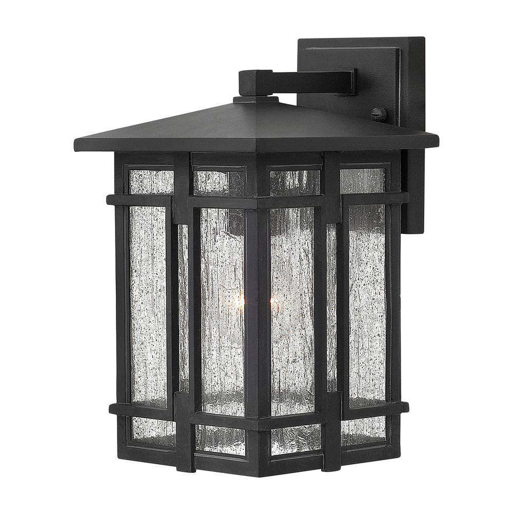 Tucker Museum Black Dimmable Outdoor Wall Sconce with Clear Seedy Glass