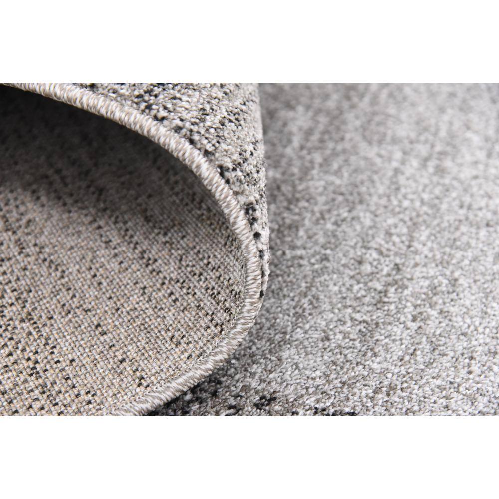 Light Gray 9' x 12' Easy Care Tufted Synthetic Rug