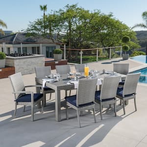 Cannes 9-Piece Wicker Outdoor Dining Set with Navy Blue Cushions