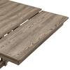 Close-up of the walnut wood table top and extended leaf.