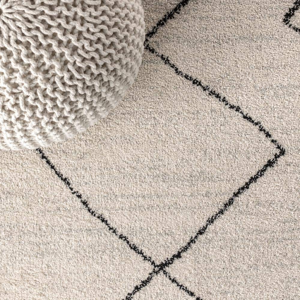 Zaina 8' x 10' Black and Cream Geometric Synthetic Area Rug