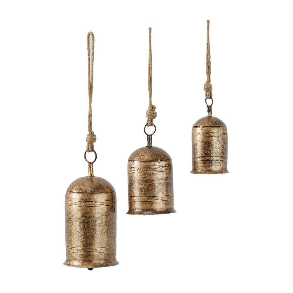 Litton Lane 5 in. x 10 in. Gold Metal Tibetan Inspired Cylindrical Decorative Cow Bell with Jute Hanging Rope (3-Pack)