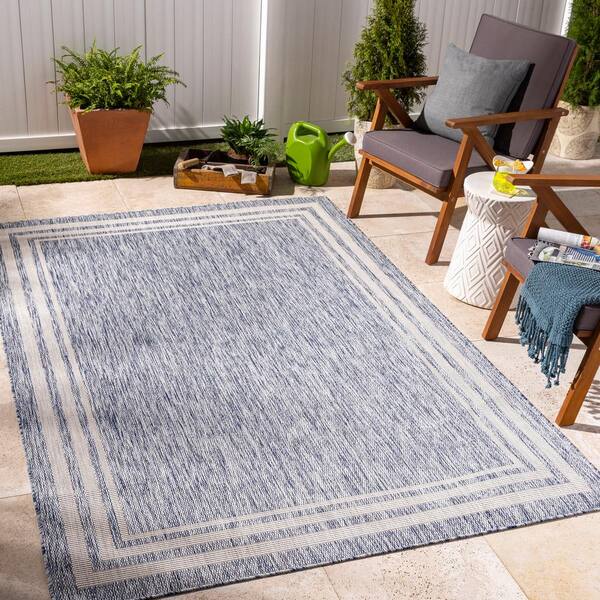 https://images.thdstatic.com/productImages/6ba9ca5e-e68a-4b5d-a6bd-adcee1c0d833/svn/blue-artistic-weavers-outdoor-rugs-s00161061154-31_600.jpg