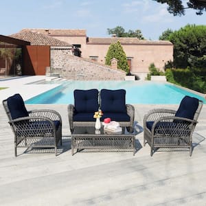 4-Piece Wicker Patio Conversation Deep Seating Set with Coffee Table and Navy Blue Cushions