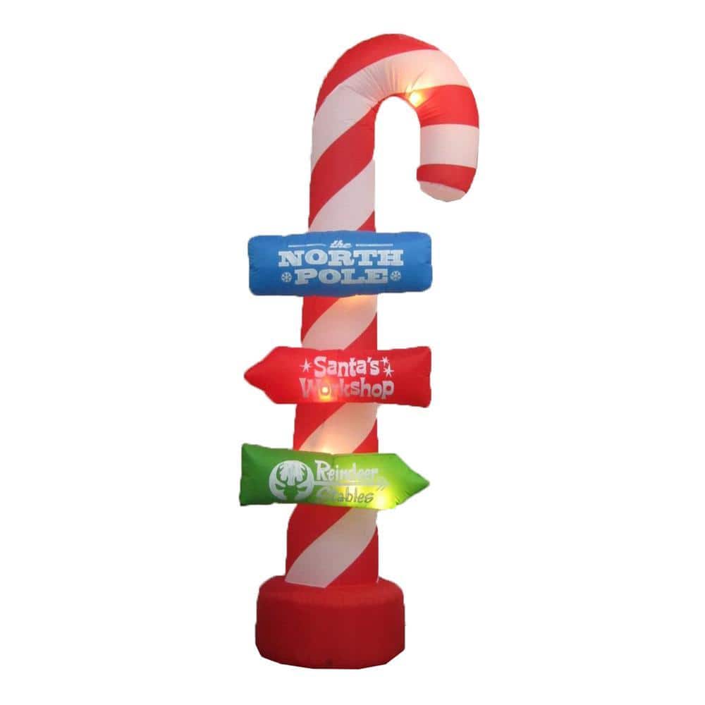 Candy Inflatable Santa's Workshop 7.8 ft. x 3.1 ft. Candy Cane Inflatable with Blower ...