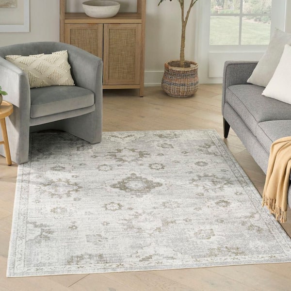 Astra Machine Washable Ivory 4 ft. x 6 ft. Distressed Traditional Area Rug
