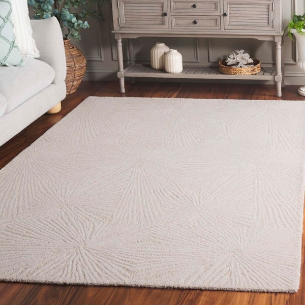 Ebony 4 ft. x 6 ft. Ivory Solid Geometric Radiant Area Rug