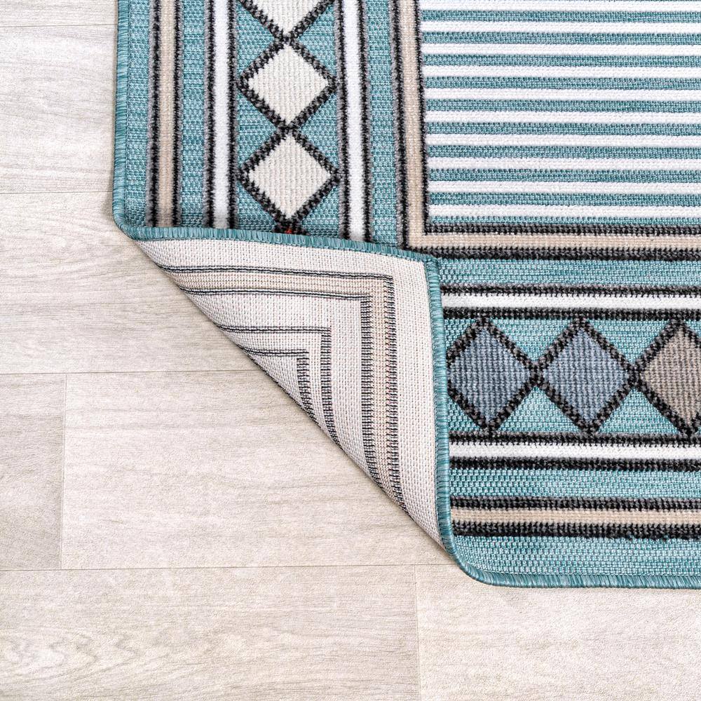 Sebastian Blue and Ivory Geometric Synthetic 5' x 8' Area Rug
