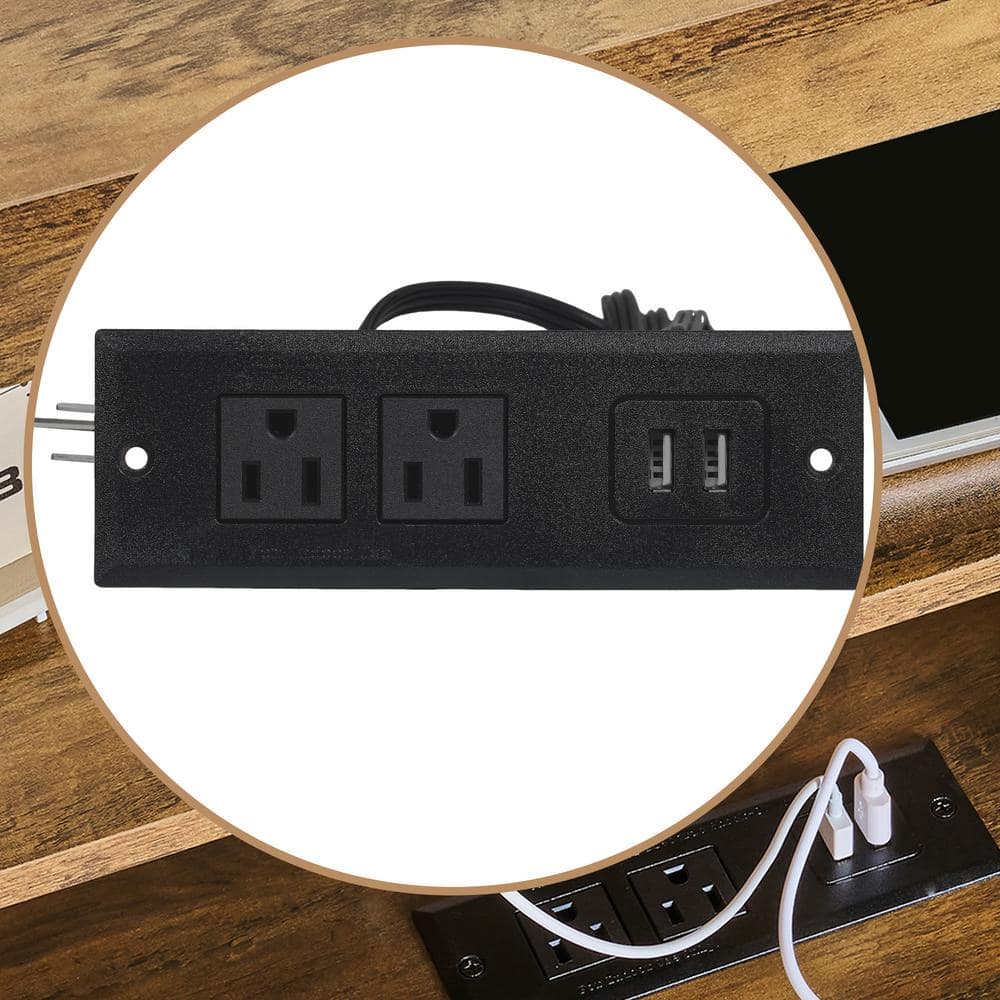 Close-up of the power strip with AC outlets and USB ports.