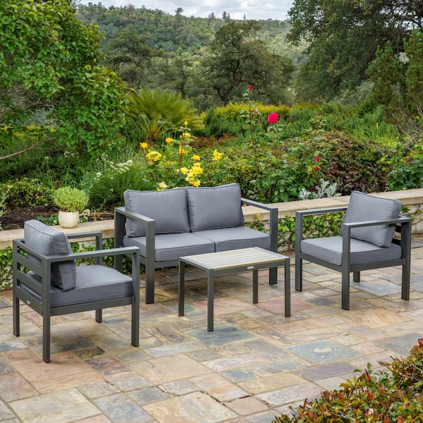 Tortuga Outdoor Lakeview 4-Piece Outdoor Conversation Set with Loveseat, Coffee Table and Charcoal Cushions (Modern Furniture Bundle)