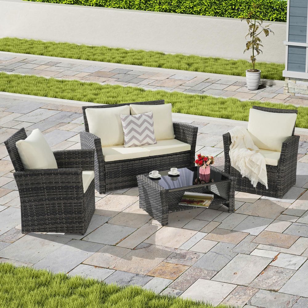 4-Piece Wicker Patio Conversation Set with Beige Cushions and Coffee Table
