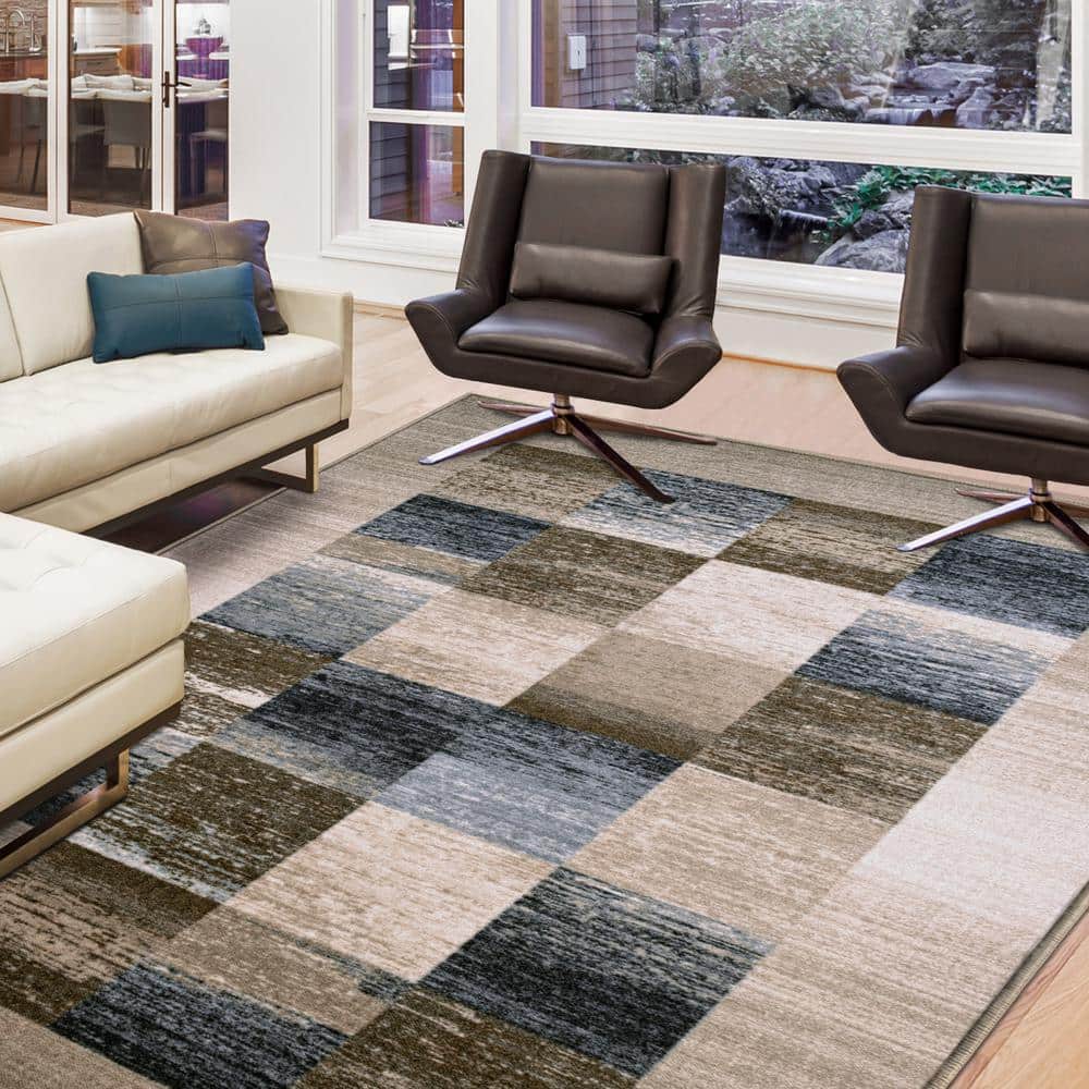 Cream 9' x 12' Non-Slip Synthetic Area Rug