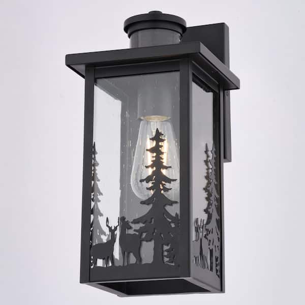 Acadia 12.25 in. H Matte Black Rustic Wildlife Motion Sensing Dusk to Dawn Outdoor Wall Sconce Light, Clear Glass