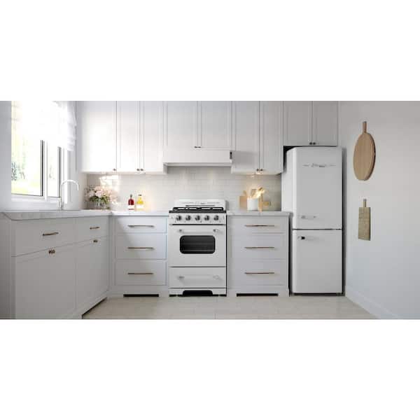 https://images.thdstatic.com/productImages/6c854bf3-afd9-4562-b6cb-e64fd51aec5c/svn/marshmallow-white-unique-appliances-bottom-freezer-refrigerators-ugp-215l-w-ac-e1_600.jpg