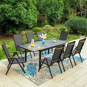 9-Piece Metal Outdoor Dining Set with Extensible Rectangular Carve Pattern Table and Black Folding Chairs