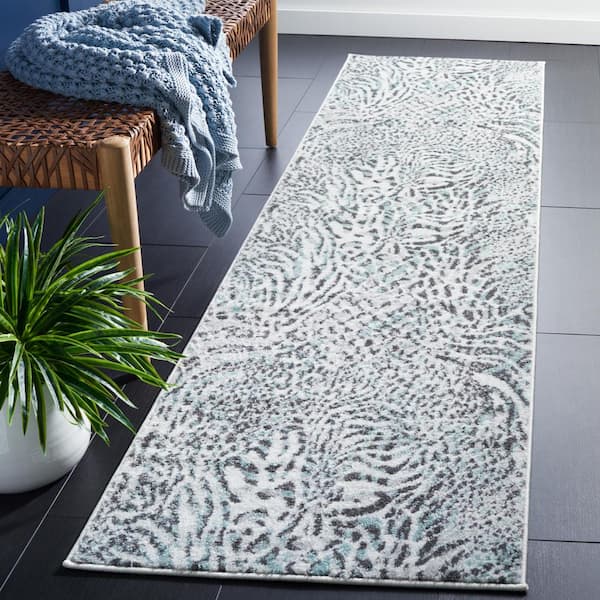 Amsterdam Ivory/Teal 2 ft. x 8 ft. Animal Print Runner Rug