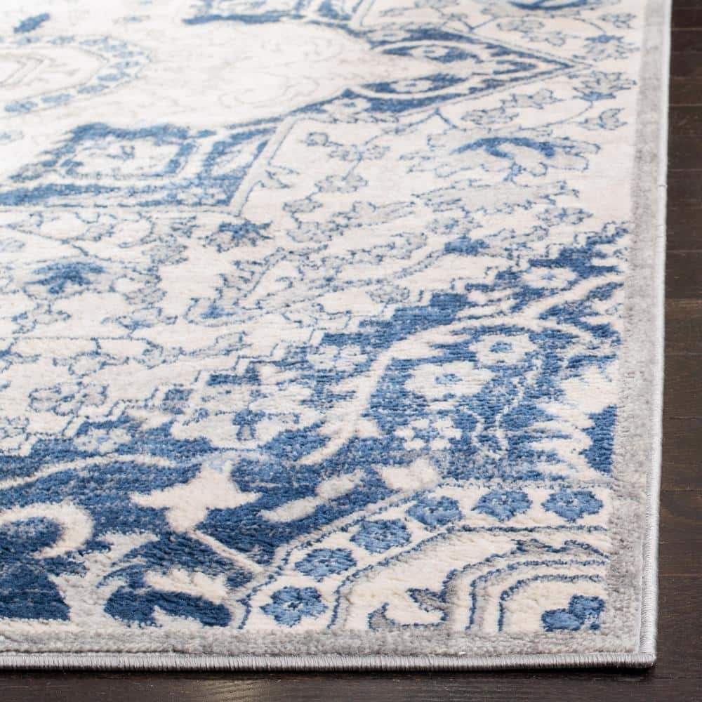 Brentwood 4' x 6' Blue and Cream Synthetic Area Rug