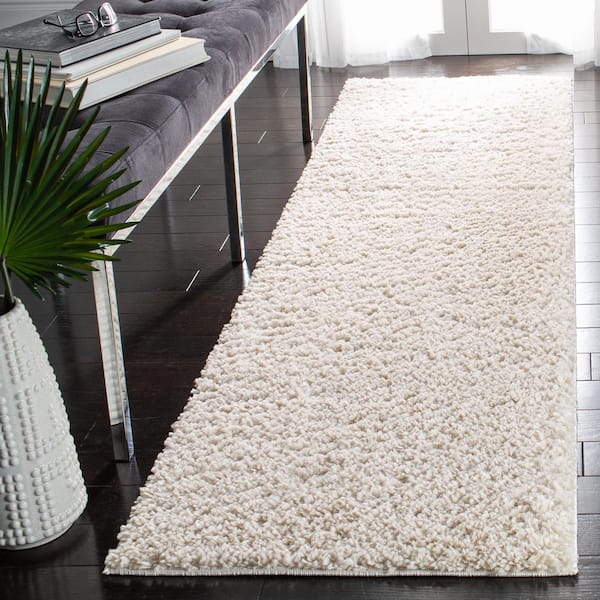 August Shag Ivory 2 ft. x 12 ft. Solid Runner Rug
