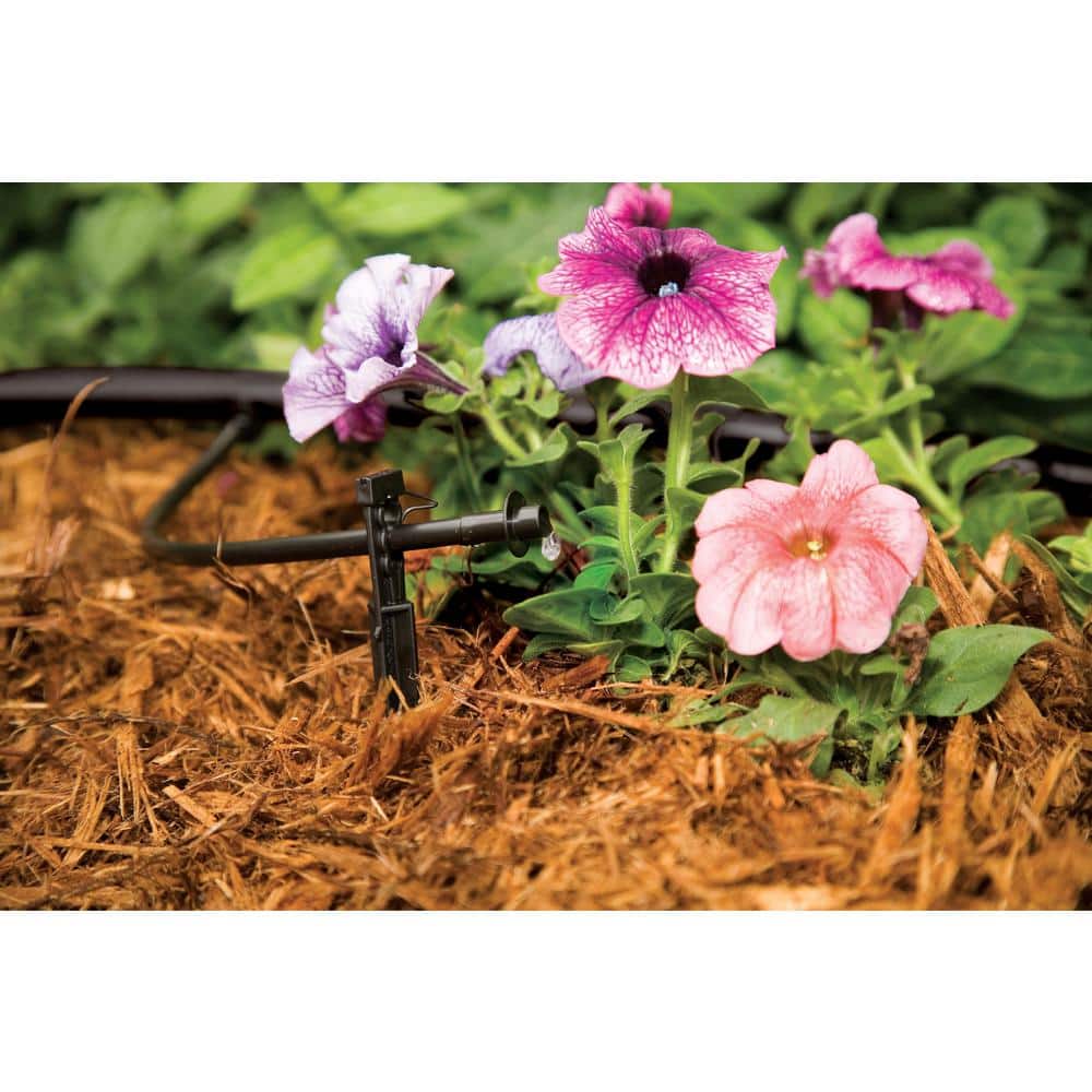 https://images.thdstatic.com/productImages/6ca9d2db-5c21-4ceb-b08b-965c52b021ea/svn/blacks-rain-bird-drip-irrigation-tubing-t70-100s-fa_1000.jpg