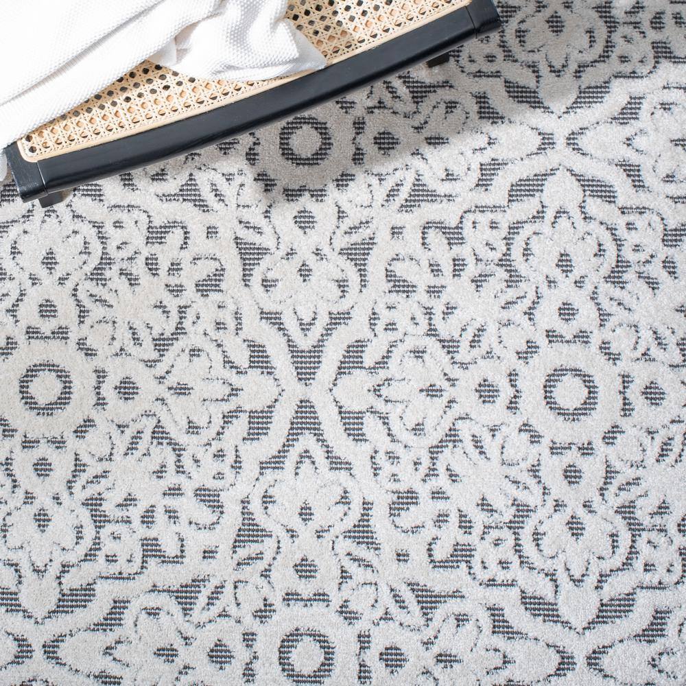 Ivory and Grey Floral Round Synthetic Indoor/Outdoor Rug
