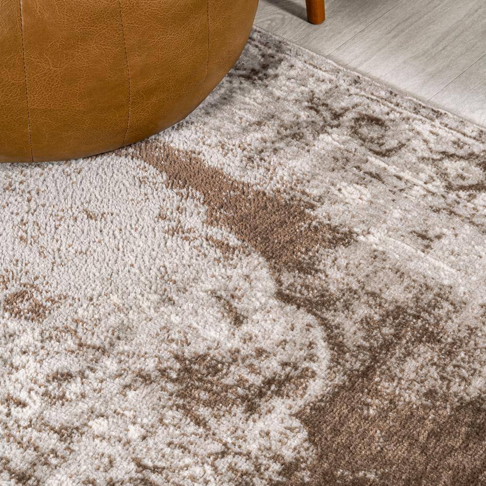 Ivory and Brown Medallion Synthetic 8' x 10' Area Rug
