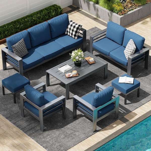 Gray 7-Piece Aluminum Patio Conversation Set with Ottomans and Blue Cushions