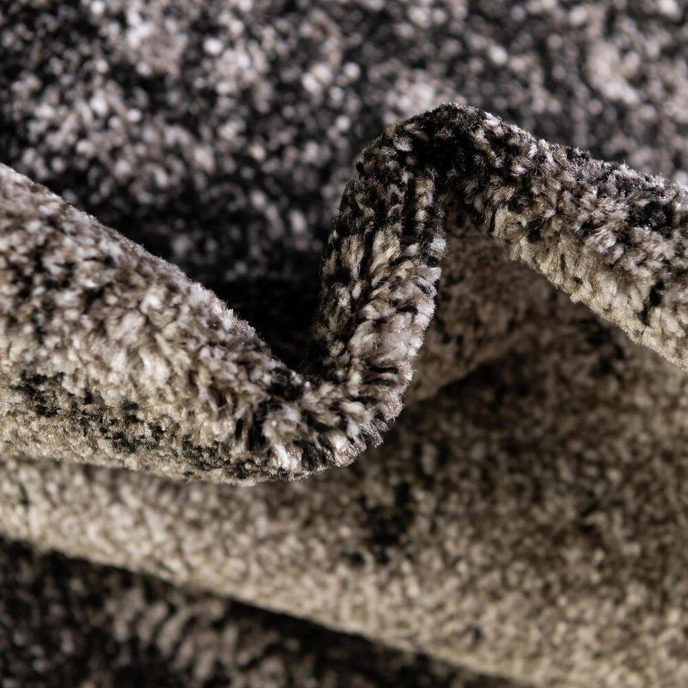 Luxurious Dark Gray Tufted 6' x 9' Easy-Care Synthetic Rug
