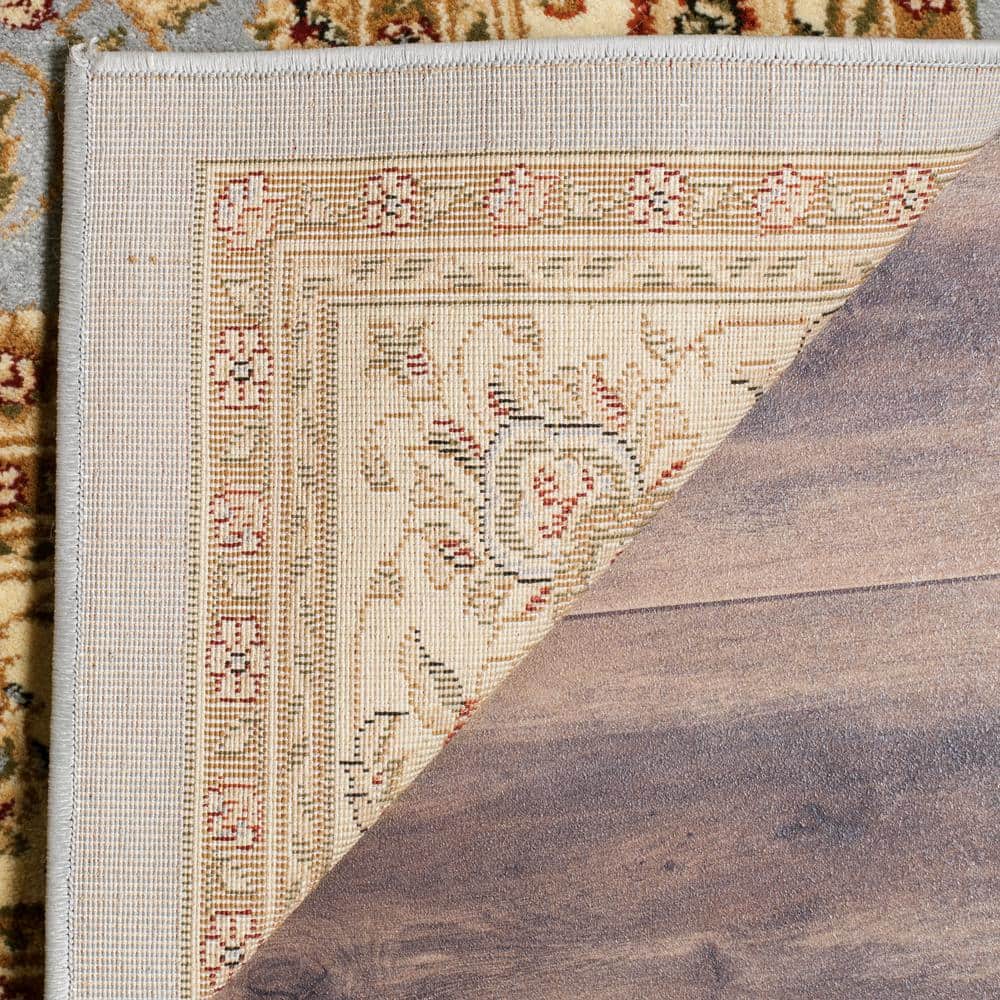 Lyndhurst Light Blue and Ivory Synthetic 10' x 14' Rectangular Area Rug