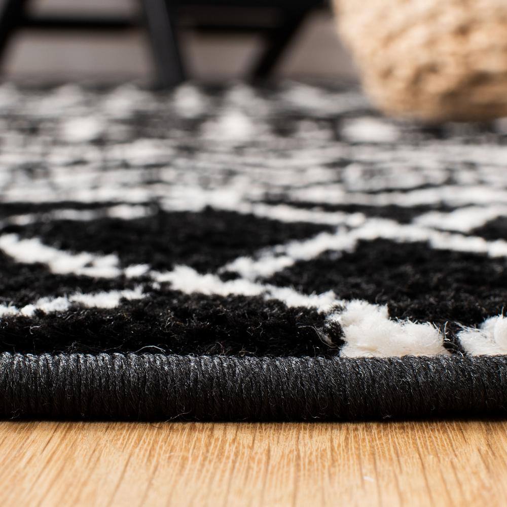 Black and Ivory Moroccan Geometric 6' x 9' Area Rug
