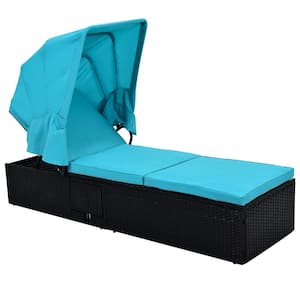 Long Reclining Black Wicker Outdoor Chaise Lounge with CushionGuard Blue Cushions Canopy and Cup Table
