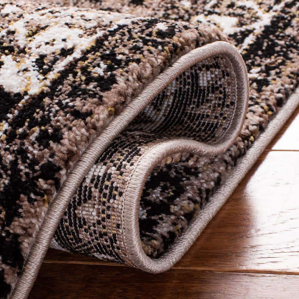 https://images.thdstatic.com/productImages/6d16a2a2-1834-4a26-a8b2-eeb062b5b952/svn/brown-black-safavieh-area-rugs-vth293t-28-4f_1000.jpg