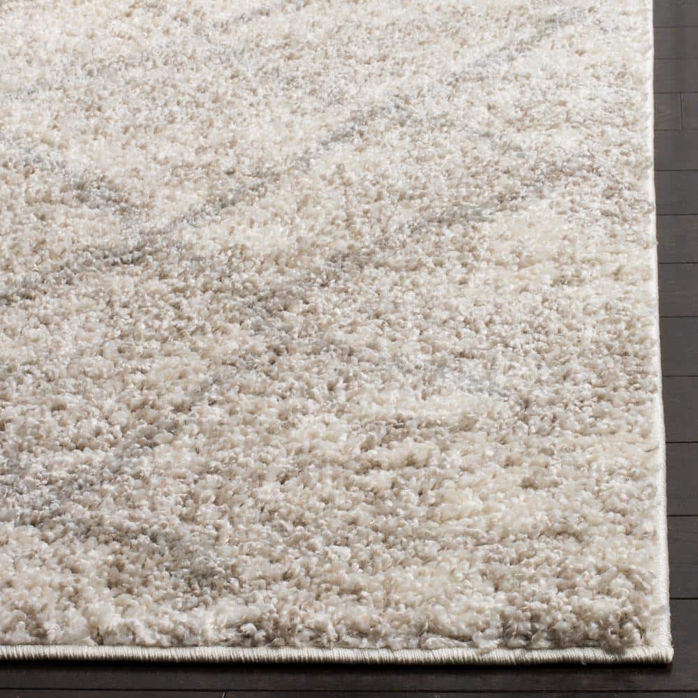 6' x 9' Gray and Cream Shag Area Rug