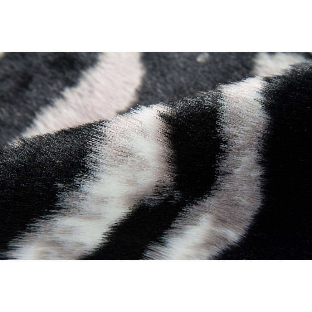 Acadia Black and White Faux Fur Zebra Area Rug